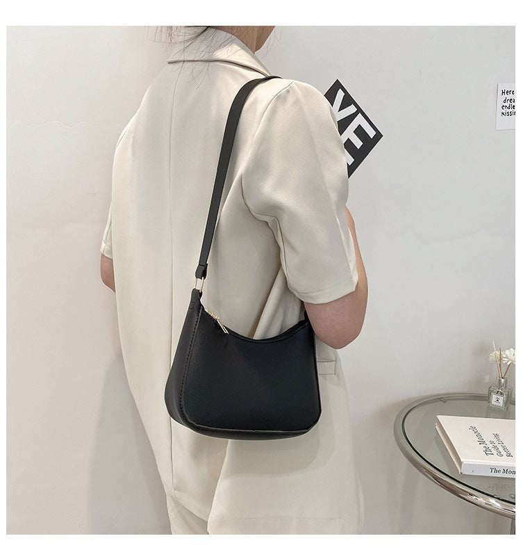 Rétrolia - Élégance vintage à porter à l'épaule